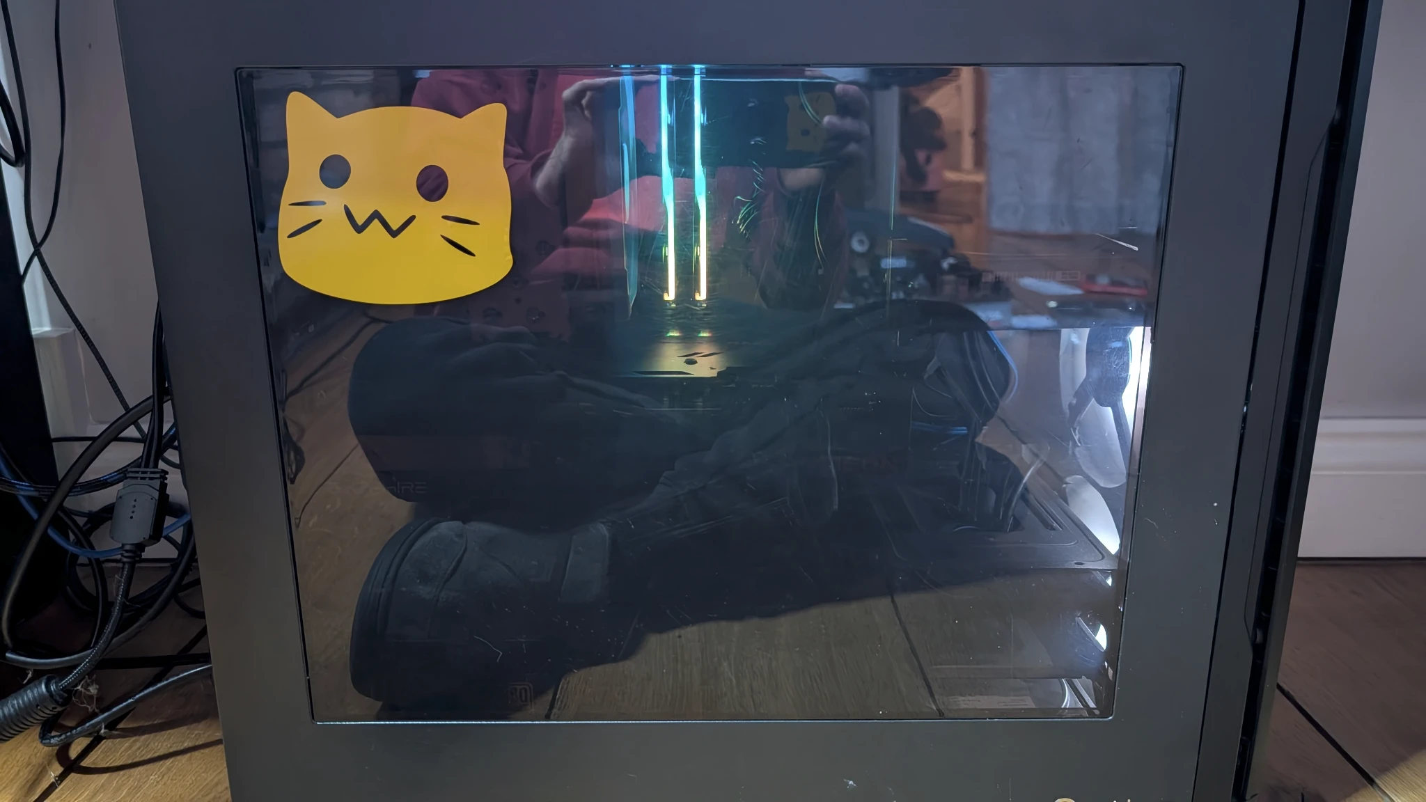 Built PC with the case fully constructed, a Blobcat sticker sits in the top-left corner of the window. Inside there is clearly RGB RAM, look it all costs the same these days.