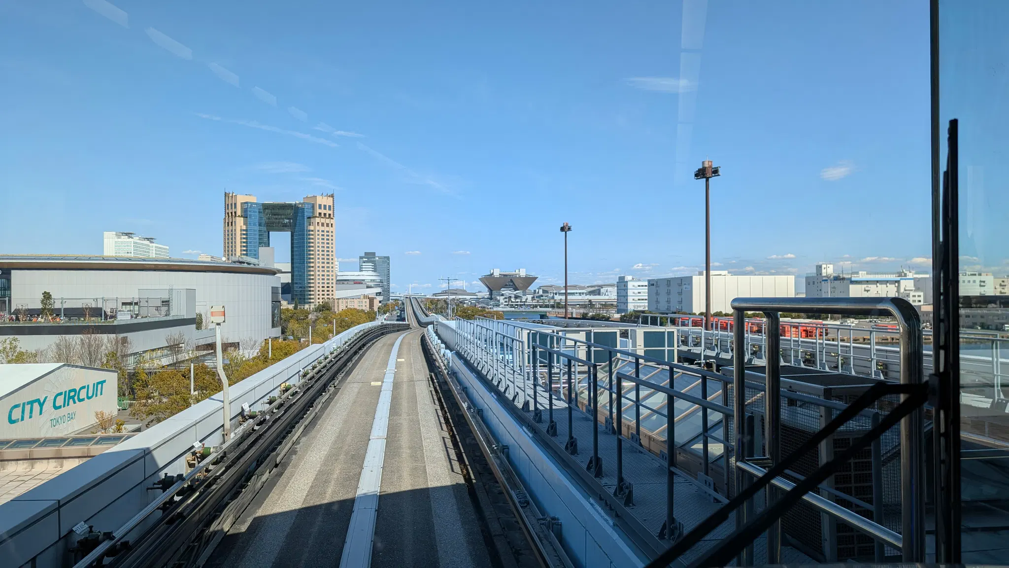 A photo of the Tokyo Big Site convention center seen from a train.